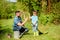 Use watering can and pot. Garden equipment. father and son in cowboy hat on ranch. Eco farm. happy earth day. Family