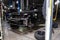 Used black car Land Rover Range Rover disassembled without bumper and wheels on a four-post lift for repairing the chassis and