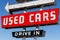 Used Car Drive In neon sign from the 50s at a pre owned car dealership I