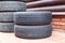 Used car tires with different tread types.Selective focus.Close up.Concept of seasonal tire change,proper operation