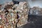 Used cardboard polyethylene and plastic pressed into bales at finished products warehouse on modern waste sorting and processing