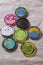 Used colorful plastic pots lids