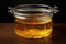 used cooking oil in a transparent container