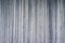 Used gray cement wall decorative grey plaster vertical stripes texture background