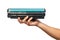 Used laser toner cartridge holding by hand of worker or user for replace, refill  with white background. Laser toner for eco and