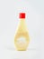 Used mayonnaise bottle on white backgrond, plastic bottle used