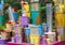 The used paint cans. Colorful paint buckets.