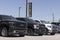 Used pickup trucks at a dealership. With supply issues, used and preowned cars are in high demand