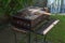 Used rectangular charcoal grill and grill grates outdoor