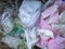 Used sanitary napkins, surgical face mask, and plastic in the trash. Infectious waste management concept. Waste separation.