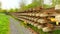 Used sleepers stock on wagon in depot. Old, dirty and rusty used concrete and wooden railway ties stored after reconstruction