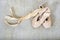 Used small ballet shoes pointe on a floor. Kid dances