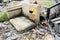 Used sofas with garbage in the landfill