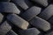 Used tire pile garage waste for recycling black rubber background
