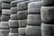 Used wheel tires stacked ready for recycling