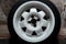 Used white titanium rims and tires with excellent tread await spring