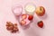 Useful breakfast, food for children, strawberry yogurt and fruits on a light table. The concept of healthy and natural food.