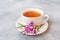 Useful herbal tea from fermented leaves fireweed on grey background. Traditional Russian Koporye Tea Ivan Chai Copy space