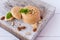 Useful Lenten cookies from almond flour stacked on white wooden cutting board on white wooden background. selective focus