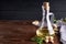 Useful Peanut oil in glass bottle. Dark wooden background Copy space