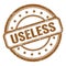 USELESS text on brown grungy vintage round stamp