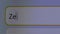 User enters text query for word Zelenskyy in search bar form of internet browser on computer. Macro pixels of monitor