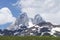 Ushba mountain in Svaneti, Georgia. Mountain landscape on a clear sunny day. Rocky mountain peaks are covered with snow