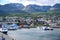 Ushuaia, Capital of Tierra del Fuego, Patagonia, Argentina. Colorful houses, boats on sea, hills and mountains.