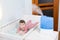 Using humidifier for newborn child comfort breathing, ultrasonic device is in bedroom