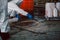Using Sand or Sawdust to Absorbent for Oil, Acid, Chemical, Liquid Spills Cleanup. Steps for Dealing with Chemical Liquid Spillage