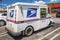 USPS mail delivery truck back corner view