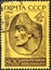 USSR - CIRCA 1966: A stamp printed in USSR shows a relief portrait of Georgian poet Shota Rustaveli with inscription and