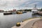 Ustka, Pomeranian / Poland - August 7, 2019: View of the fishing port on the Baltic Sea. Harbor buildings in a small town in