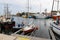 Ustka, Pomeranian / Poland - August 7, 2019: View of the fishing port on the Baltic Sea. Harbor buildings in a small town in