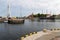 Ustka, Pomeranian / Poland - August 7, 2019: View of the fishing port on the Baltic Sea. Harbor buildings in a small town in