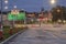 UTICA, NEW YORK - SEP 30, 2018: Night shot of Utica City Streets with sign and traffic light in the background