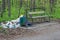 Utilities park Guzovskogo in Cheboksary not taken out the trash near the park benches. Chuvash Republic, Russia. 05/11/2016