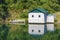 Utility Building reflecting in the Watauga River in Tennessee