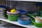 Utility dishes washed in the dishwasher area, in the kitchen of the restaurant