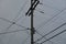 Utility Pole With Large Amount Of Power Lines And Telephone Cables