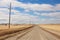 utility pole line running through a rural landscape