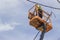 Utility worker fixes the power line