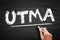 UTMA - Uniform Transfers to Minors Act acronym, law concept on blackboard