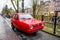 Utrecht, Netherlands - January 08, 2020. Old three wheels red car Reliant Robin