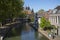 Utrecht, Netherlands - September 27, 2018: Students relaxing near the site of a canal in the center of Utrecht