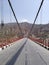 Uttarakhand, India - April 4th, 2021 : Dobra-Chanti bridge. The 725-metre long Dobra-Chanti suspension bridge over the Tehri lake