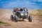 UTV buggy offroad vehicle racing on sand. Extreme, adrenalin. 4x4