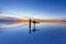 Uyuni reflections are one of the most amazing things that a photographer can see. Here we can see how the sunrise over an infinite