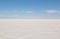 Uyuni Salar in Bolivia. Blue Sky and white salt ground