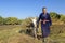 Uzbek man in agricultural field, Uzbekistan